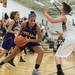 Ypsilanti's Cara Easley drives to make a shot against Dexter's Makenzie Svihra during their game, Friday Jan. 11.
Courtney Sacco I AnnArbor.com 